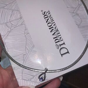 DIAMONDS International Silver Necklace with Purple Teardrop Pendant